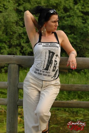 Smoking Mina offers a free xxx photo gallery with Mina has a superb shape